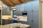 Gray cabinets with New Mexico accents