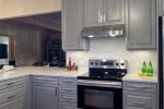 Gray cabinets with New Mexico accents